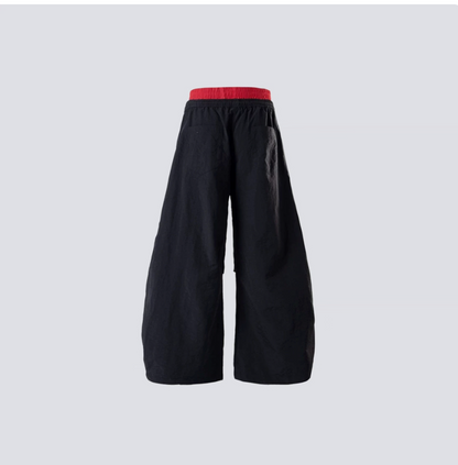 Black and red faux two-piece wide-leg pants with waistband
